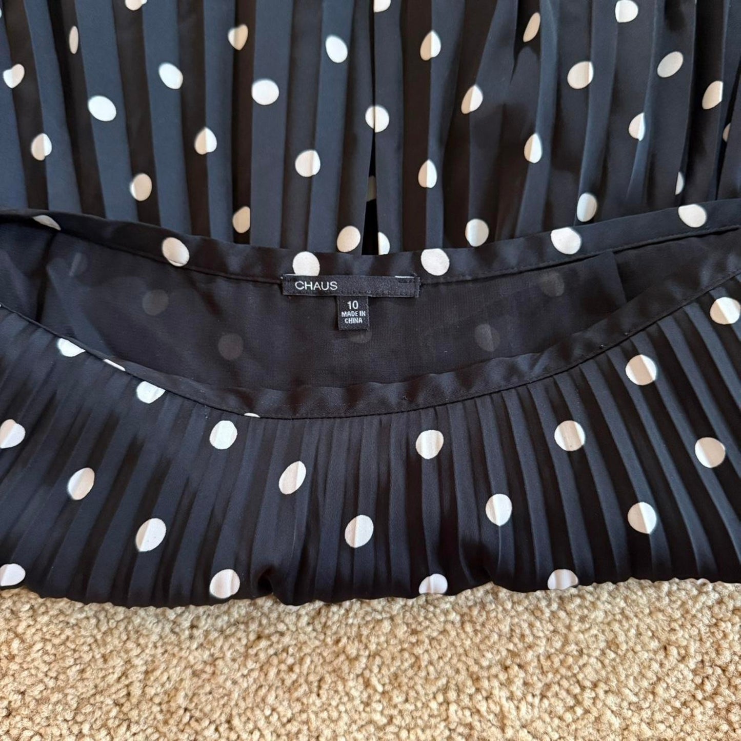 Black and white polka dot pleated midi skirt