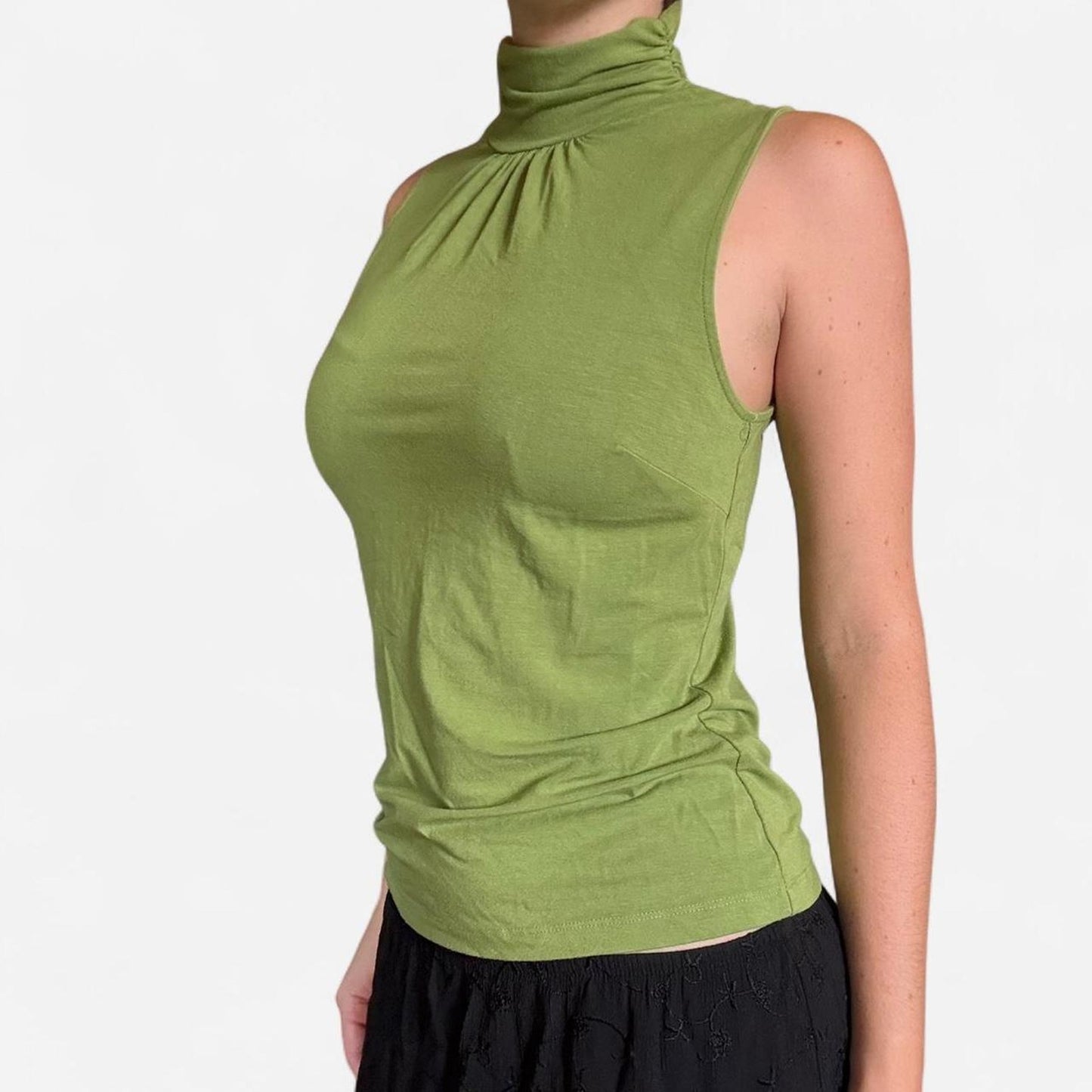 Green silk turtleneck top