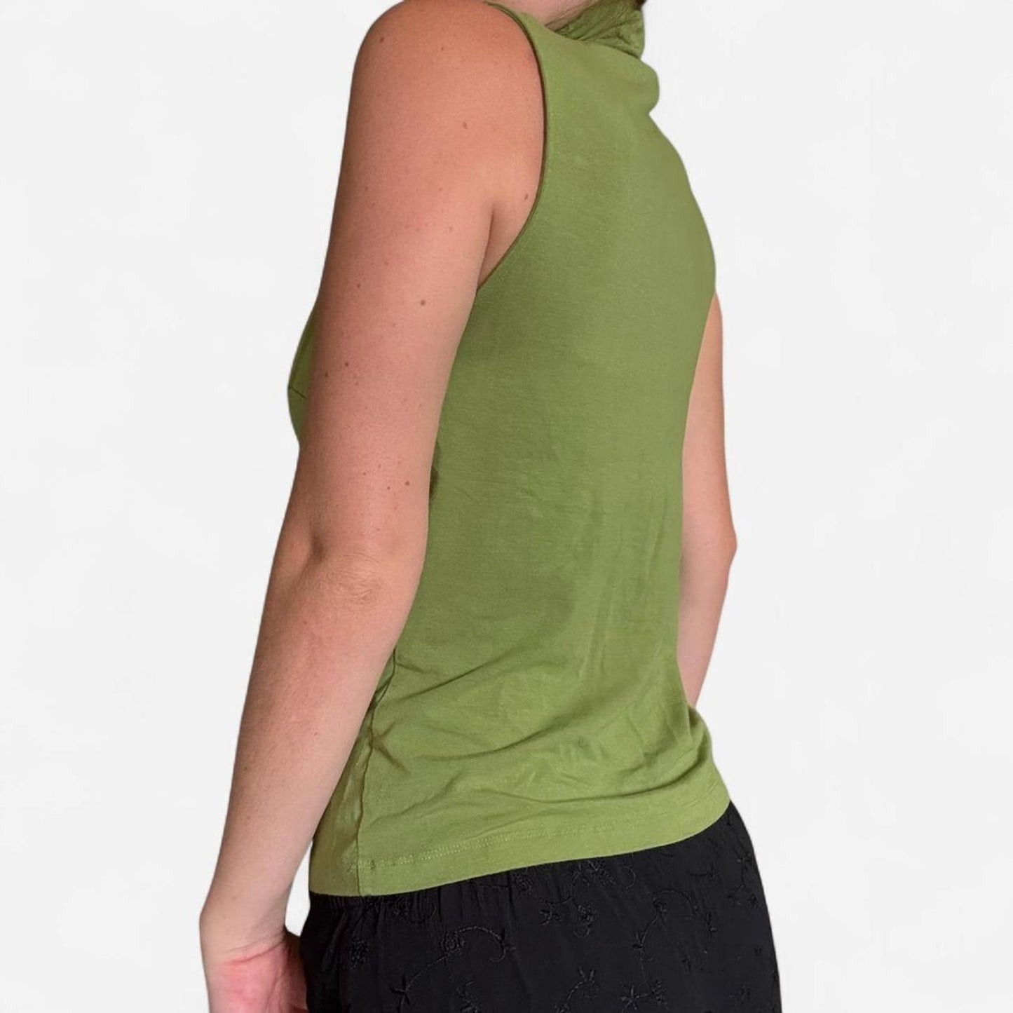Green silk turtleneck top