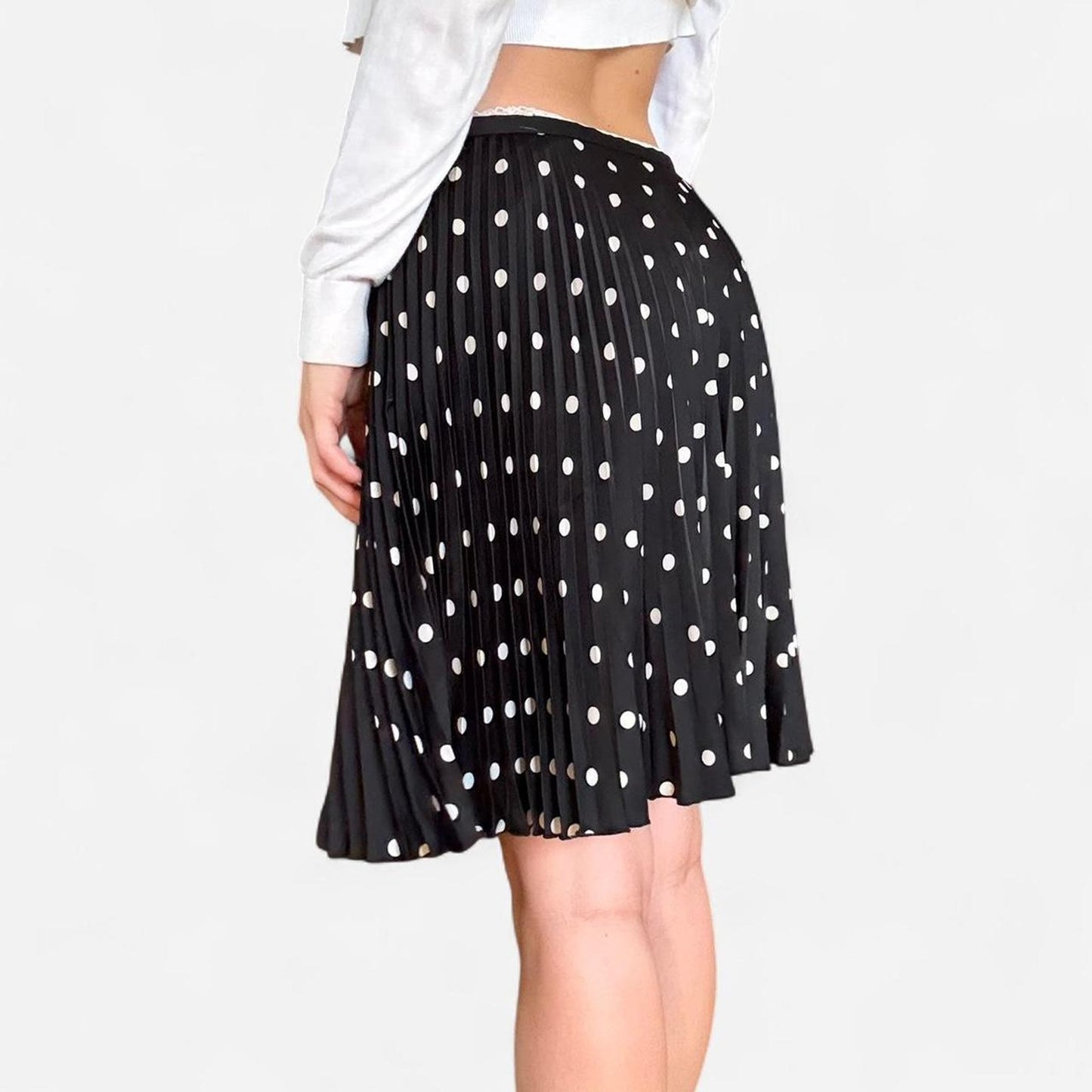 Black and white polka dot pleated midi skirt