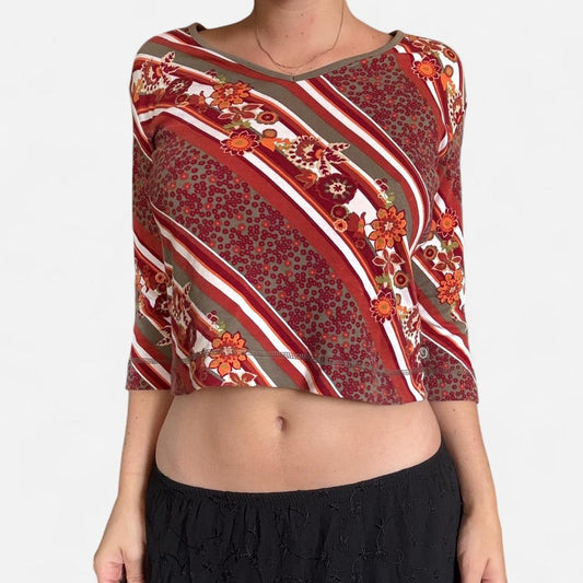 Whimsical red and green floral top