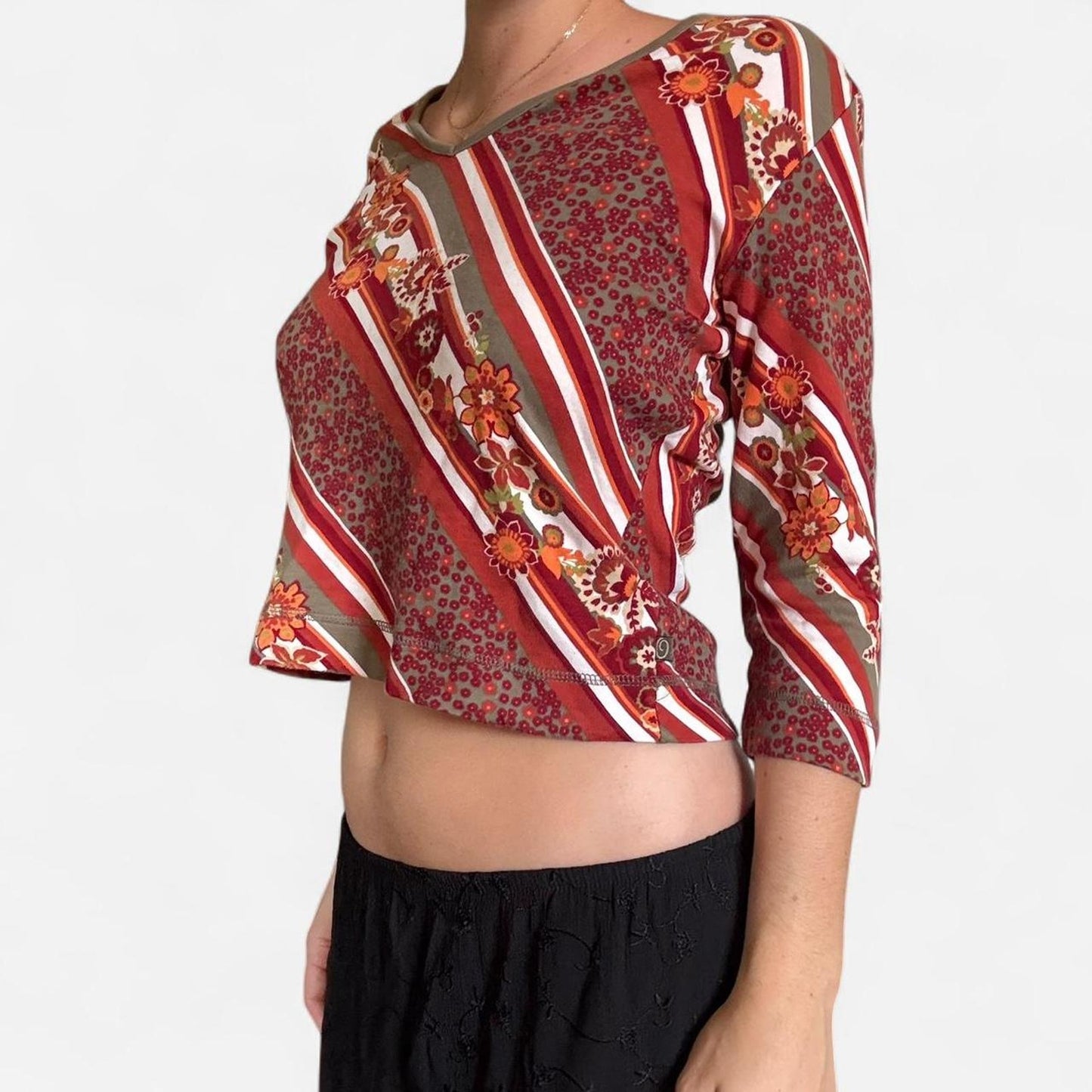 Whimsical red and green floral top